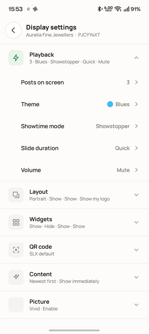 The display settings screen with Playback, Layout, Widgets, QR code, Content and Picture groups